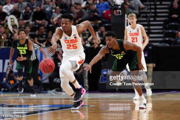 Tyus Battle of the Syracuse Orange drives against Jared Butler of the Baylor Bears during the second half in the first round of the 2019 NCAA Men's...