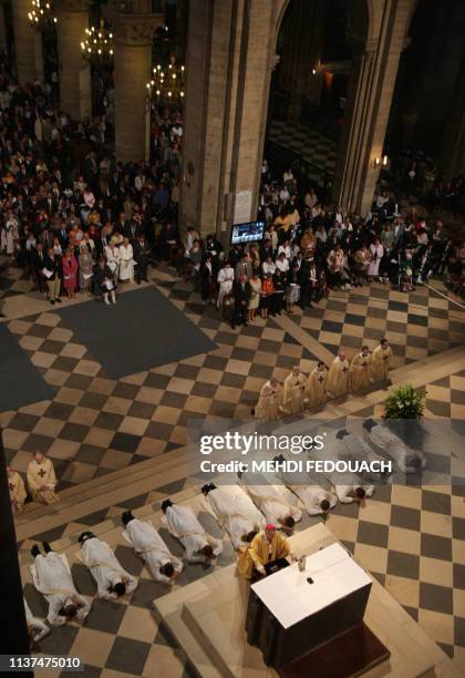 Paris archbishop Andre Vingt-Trois celebrates a mass for the ordinance of twelve new priests , 23 June 2007 at Notre-Dame de Paris cathedral in the...