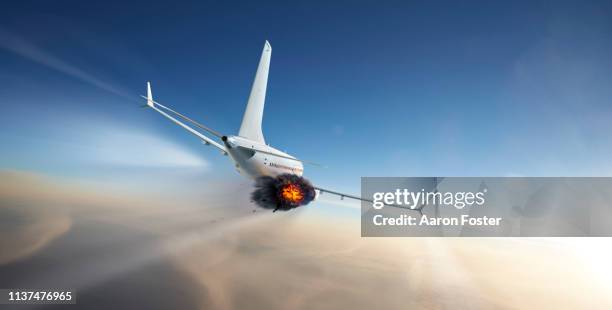 gerneric aircraft in flight with engine failure - airplane crash stock-fotos und bilder