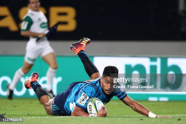 Rieko Ioane of the Blues scores a try during the round six Super Rugby match between the Blues and the Highlanders at Eden Park on March 22, 2019 in...