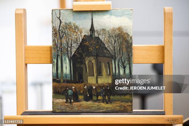 The painting 'Congregation Leaving the Reformed Church in Nuenen' by Vincent van Gogh is pictured after it was returned back to the permanent...