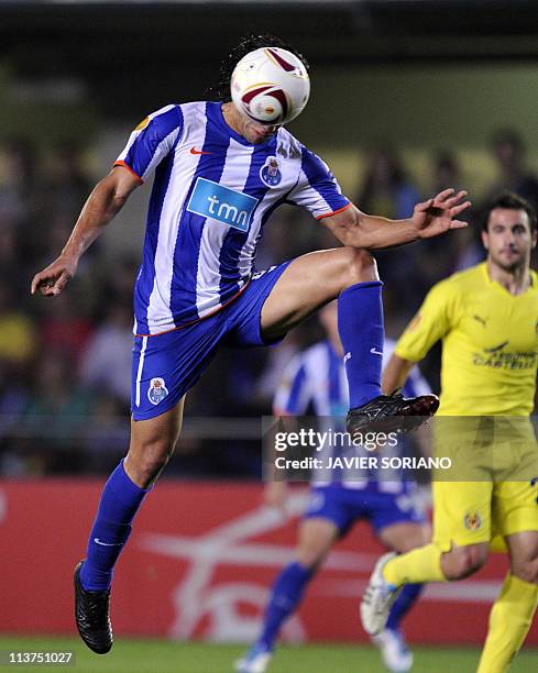 Porto's Colombian forward Radamel Falcao heads the ball during the UEFA Europa League semi-final second leg football match between Villarreal and...