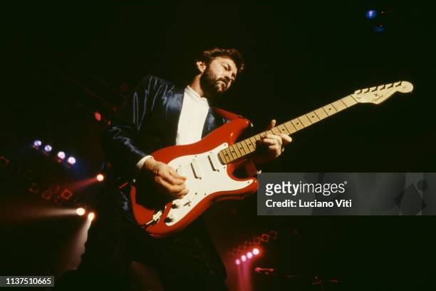 Guitarist, songwriter and vocalist Eric Clapton performing in Rome, Italy, 1986. He is playing a Fender Stratocaster guitar.