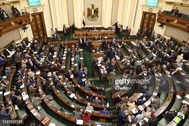 Egypt's members of parliament attend a session in Cairo on April 16, 2019. - Egypt's parliament, packed with loyalists of President Abdel Fattah...