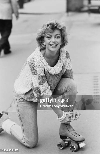 British actress and singer Sarah Payne on roller skates in London, UK, 6th May 1984.