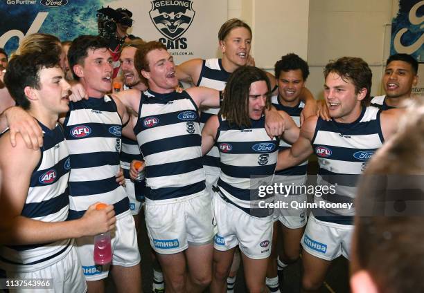Jordan Clark, Charlie Constable, Gary Rohan, Bryan Miers and Tom Atkins of the Cats Sings the song in the rooms after winning the round one AFL match...
