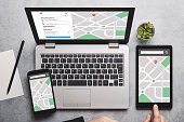 Location tracker concept on laptop, tablet and smartphone screen