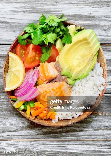 rice bowl with vegetables and salmon - rice bowl stock-fotos und bilder