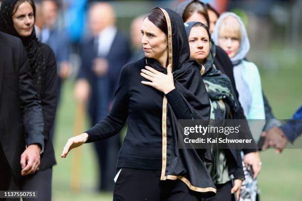 New Zealand Prime Minister Jacinda Ardern greets members of the public after attending islamic prayers in Hagley Park near Al Noor mosque on March...