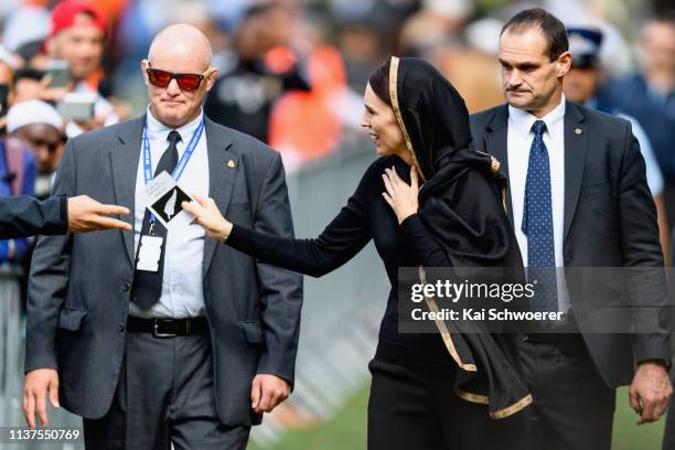 New Zealand Prime Minister Jacinda Ardern greets members of the public after attending islamic prayers in Hagley Park near Al Noor mosque on March...