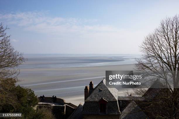 Mont Saint Michel, Normandy, France, March 28, 2019. The bay of Mont Saint Michel in the morning on a clear day from the abbey. Mont Saint Michel,...