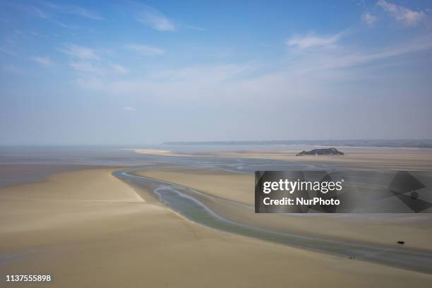 Mont Saint Michel, Normandy, France, March 28, 2019. The bay of Mont Saint Michel in the morning on a clear day from the abbey. Mont Saint Michel,...