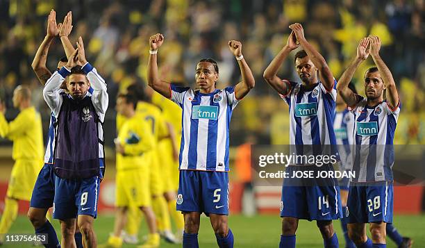 Porto's player celebrate after the UEFA Europa League semi-final second leg football match between Villarreal and Porto at the Madrigal Stadium in...