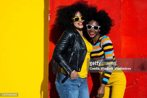 women in color - jacket stock pictures, royalty-free photos & images