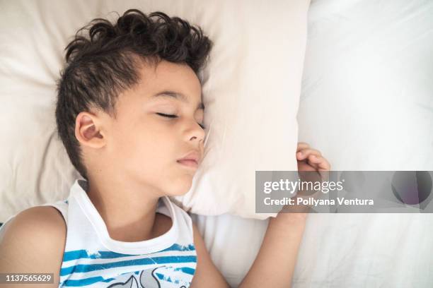 bedtime - sleeping boys stockfoto's en -beelden