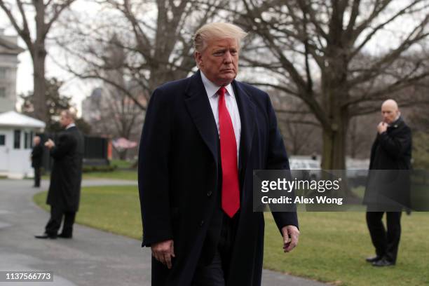 President Donald Trump speaks to members of the media on the South Lawn prior to his departure from the White House March 22, 2019 in Washington, DC....