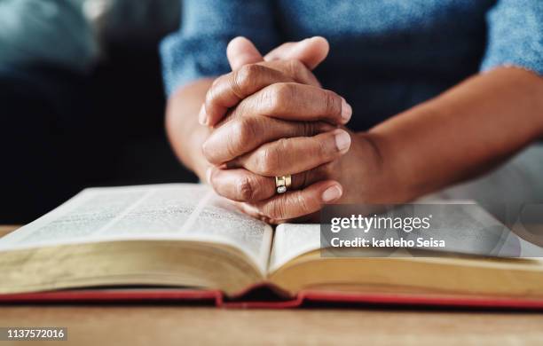 let's read out of the good book - catholic religion stock pictures, royalty-free photos & images