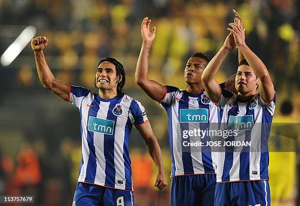 Porto's Colombian forward Radamel Falcao, FC Porto's Colombian midfielder Fredy Guarin and FC Porto's Colombian forward James Rodriguez celebrate...