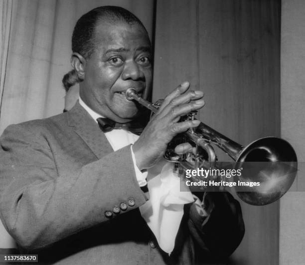 Louis Armstrong on stage on Day 2, Finsbury Park Astoria, London, 1962. Artist Brian Foskett.