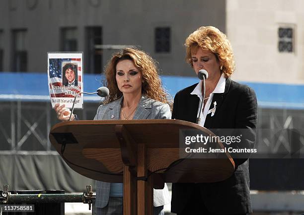 Family members of the victims of the September 11 terror attacks read the names of those lost on September 11, 2001 during the ceremony to...