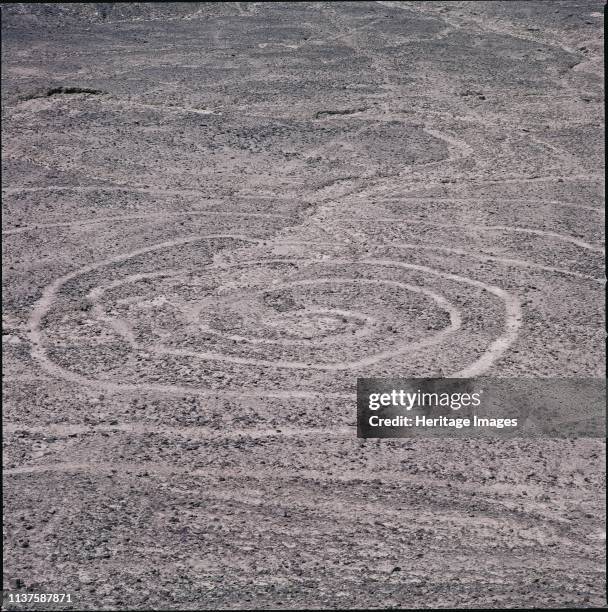 The Nazca Lines are a series of large ancient geoglyphs in the Nazca Desert, in southern Peru,designated as a UNESCO World Heritage Site in 1994....