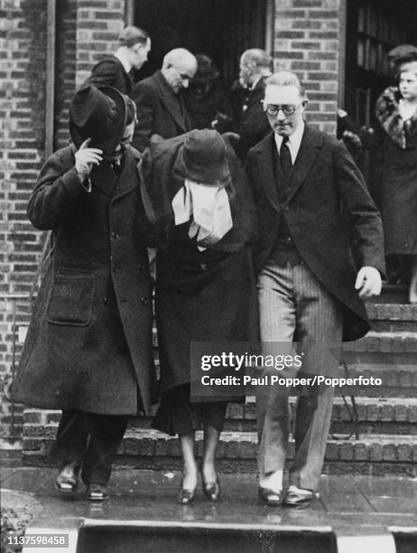 Alice Kenny Diamond , widow of Irish American gangster, Jack 'Legs' Diamond, is supported as she follows her husband's coffin at his funeral at Mt...