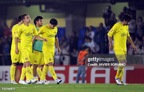 Villarreal players react during the UEFA Europa League semi-final second leg football match between Villarreal and Porto at the Madrigal Stadium in...