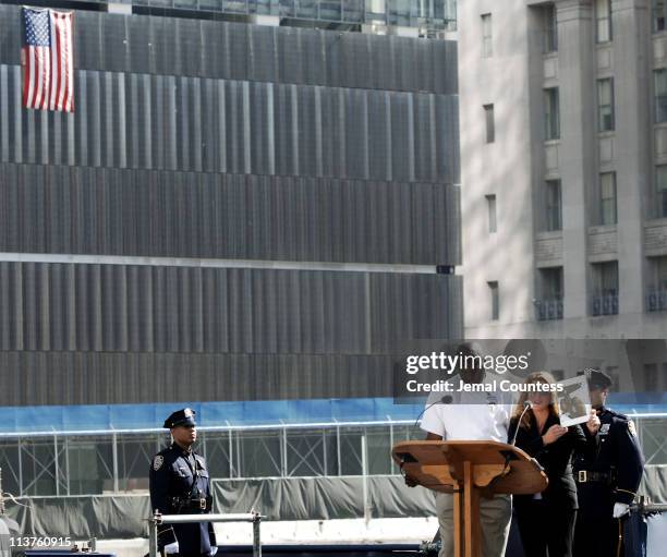 Family members of the victims of the September 11 terror attacks read the names of those lost on September 11, 2001 during the ceremony to...