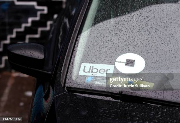 The Uber logo is displayed on a car on March 22, 2019 in San Francisco, California. Uber Technologies Inc. Announced that it has selected the New...