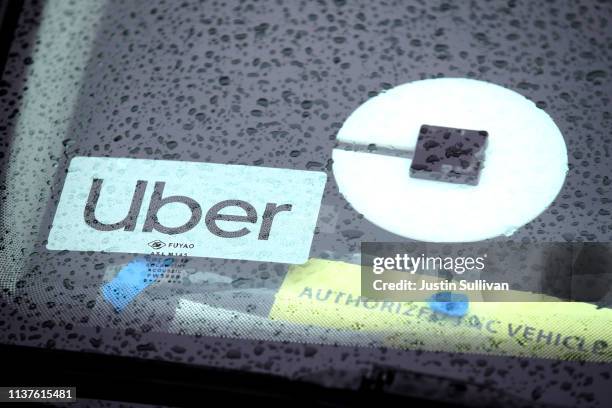 The Uber logo is displayed on a car on March 22, 2019 in San Francisco, California. Uber Technologies Inc. Announced that it has selected the New...