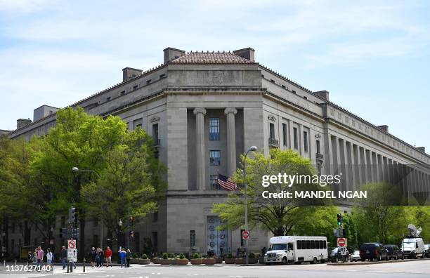 An April 16, 2019 photo shows the Department of Justice in Washington, DC. - A redacted version of special counsel Robert Mueller's report into...