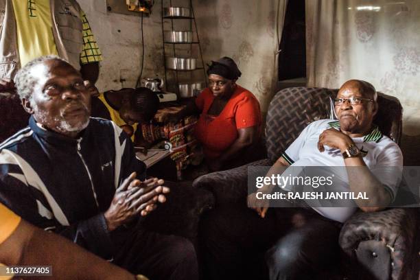 Former South African President and former president of the ruling party African National Congress Jacob Zuma meets residents during a door to door...