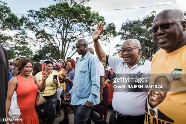 Former South African President and former president of the ruling party, the African National Congress Jacob Zuma waves to supporters during a short...