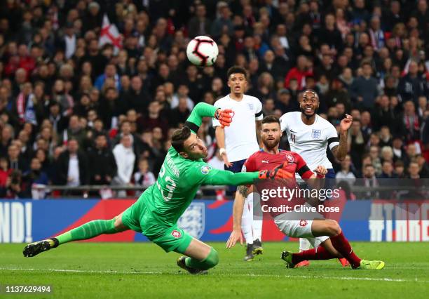 Raheem Sterling of England scores his team's third goal past Jiri Pavlenka and Ondrej Celustka of the Czech Republic during the 2020 UEFA European...