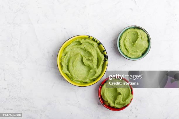 green guacamole sauce - guacamole stock pictures, royalty-free photos & images