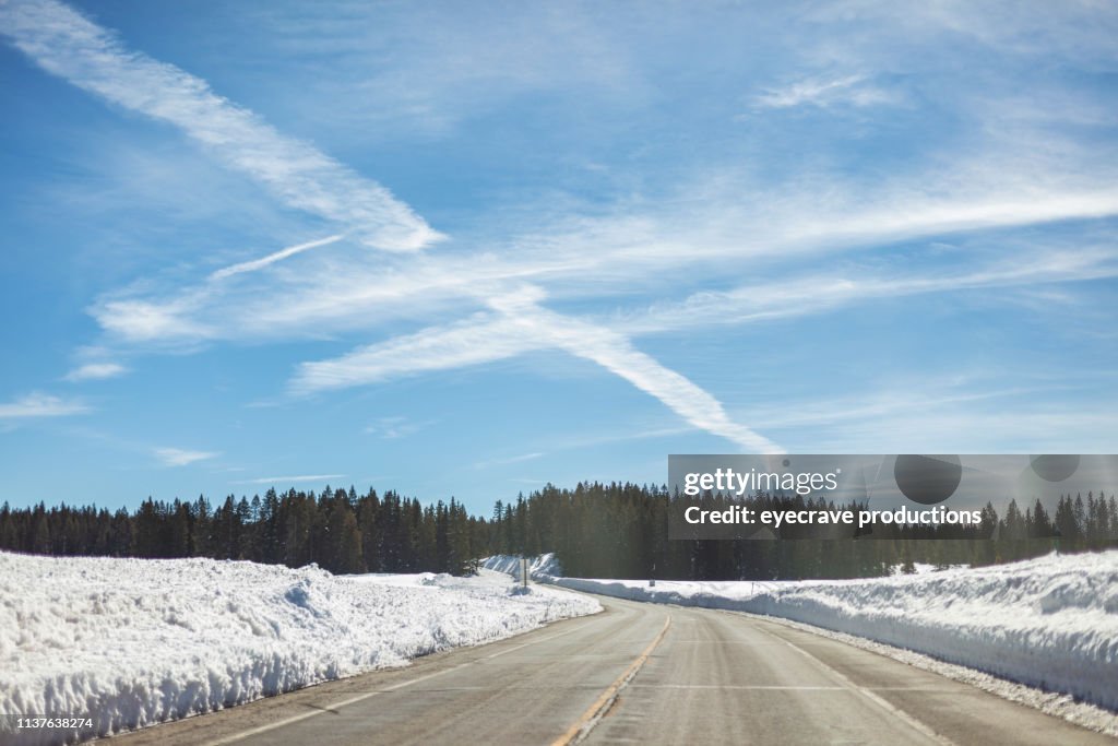 Snowy Winter Mountain Road with High Snow Banks in Western Colorado