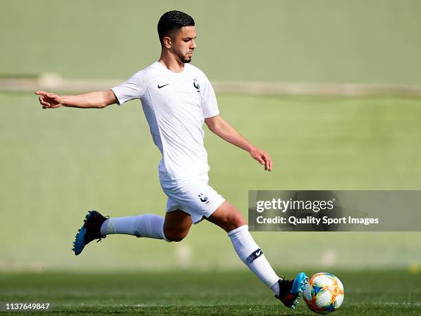 Imran Louza of France runs with the ball during the U-20 International friendly match between United States and France at Pinatar Arena on March 22,...