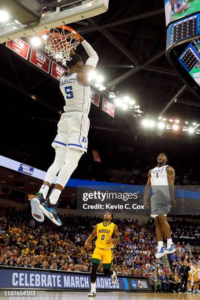 Barrett of the Duke Blue Devils dunks the ball as teammate Zion Williamson celebrates against the North Dakota State Bison in the second half during...