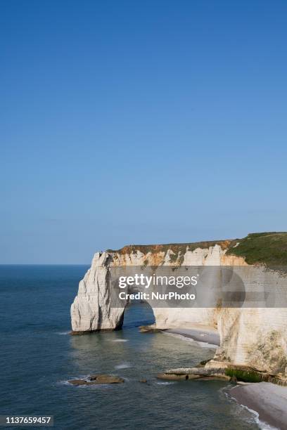 Etretat, Normandy, France, March 25, 2019. The cliff of La Manneporte in good weather. Etretat, Normandie, France, le 25 mars 2019. La falaise de La...