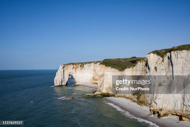 Etretat, Normandy, France, March 25, 2019. The cliff of La Manneporte in good weather. Etretat, Normandie, France, le 25 mars 2019. La falaise de La...