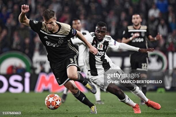 Ajax's Dutch defender Joel Veltman outruns Juventus' French midfielder Blaise Matuidi during the UEFA Champions League quarter-final second leg...