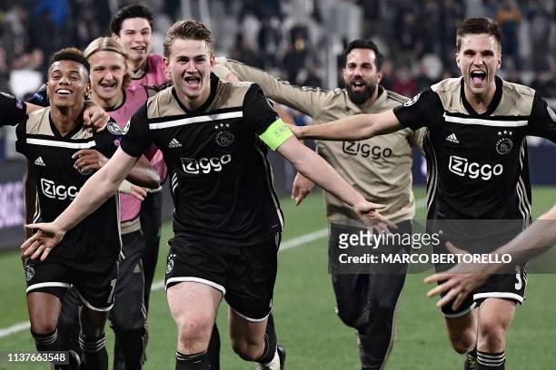 Ajax's Brazilian forward David Neres , Ajax's Dutch defender Matthijs de Ligt , Ajax's Dutch defender Joel Veltman and teammates celebrate after...