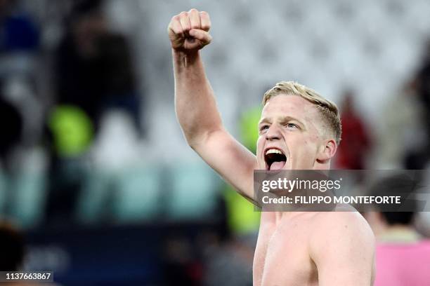 Ajax's Dutch midfielder Donny van de Beek celebrates at the end of the UEFA Champions League quarter-final second leg football match Juventus vs Ajax...