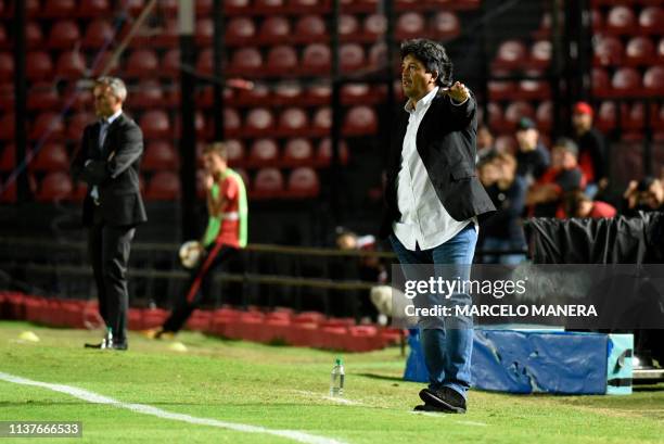 Peruvian Deportivo Municipal's Victor Rivera gives instructions to his players during a Copa Sudamericana 2019 football match against Argentinian...