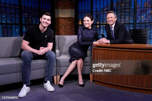 Episode 826 -- Pictured: Charlie Hall, actress Julia Louis-Dreyfus during an interview with host Seth Meyers on April 16, 2019 --