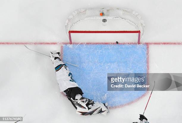 Aaron Dell of the San Jose Sharks allows a goal during the second period against the Vegas Golden Knights in Game Four of the Western Conference...