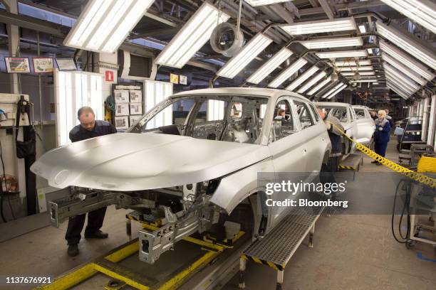 Workers assemble a Skoda Kodiaq automobile on the production line at the GAZ Group plant in Nizhny Novgorod, Russia, on Tuesday, April 16, 2019. Oleg...