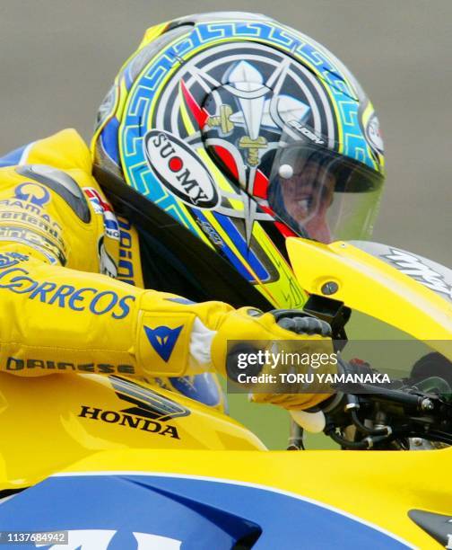 Italian MotoGP rider Max Biaggi in action during the qualifying practice session for the motorcycle Grand Prix of Japan in Suzuka, central Japan, 05...