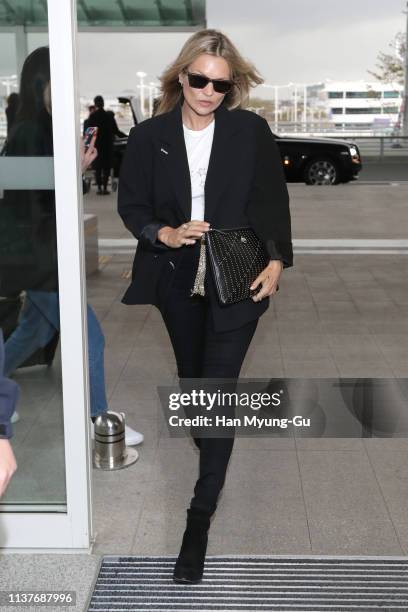 Model Kate Moss is seen on departure at Incheon International Airport on March 23, 2019 in Incheon, South Korea.