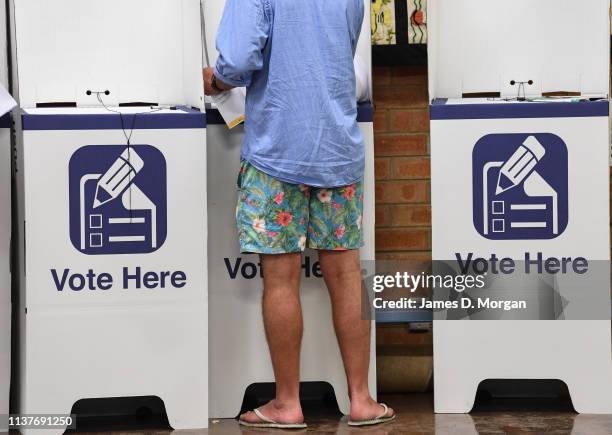 Voters heading to cast their vote at Culburra Public School in the electoral district of South Coast on March 23, 2019 in Culburra Beach, Australia....